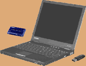 Compaq Evo N410c sub-notebook with USB multi-card reader and bluetooth USB adaptor.